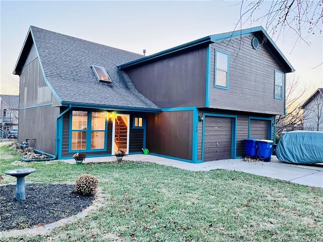 766 Spring Cir, Liberty, MO 64068 - view of front of home with a shingled roof, a front lawn, driveway, and an attached garage