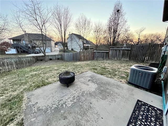 766 Spring Cir, Liberty, MO 64068 - view of yard with central AC, a fire pit, and a patio area