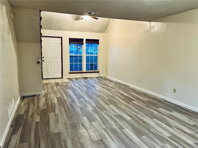 766 Spring Cir, Liberty, MO 64068 - spare room with wood finished floors, ceiling fan, and baseboards