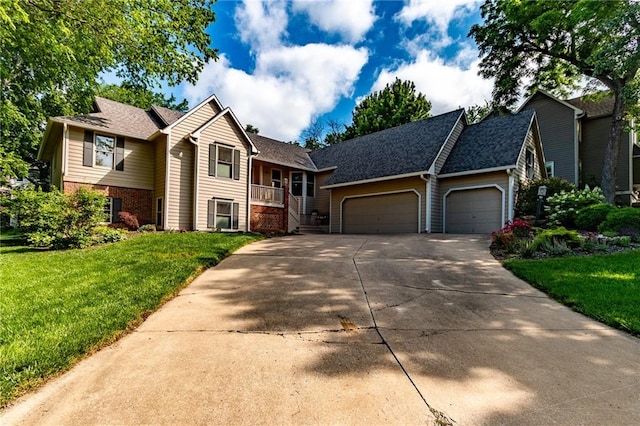 4612 Royal Birkdale Ct, Lawrence, KS 66049 - view of front facade featuring driveway, an attached garage, a front yard, brick siding, and roof with shingles
