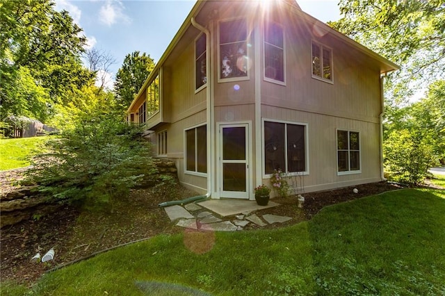 4612 Royal Birkdale Ct, Lawrence, KS 66049 - back of property featuring a lawn