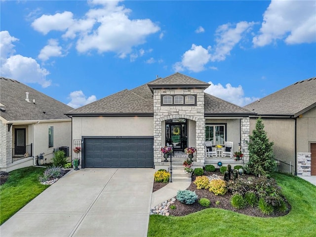 15278 W 173rd St, Olathe, KS 66062 - french country inspired facade with stone siding, a garage, driveway, stucco siding, and roof with shingles