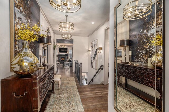 15278 W 173rd St, Olathe, KS 66062 - entrance foyer featuring a chandelier, crown molding, and wood finished floors
