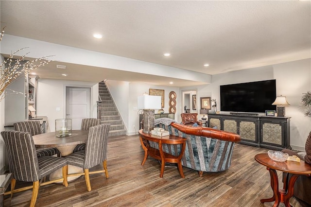 15278 W 173rd St, Olathe, KS 66062 - living area with wood finished floors, stairway, recessed lighting, and a textured ceiling