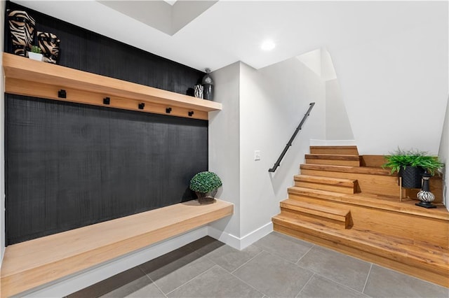 6111 Persimmon Ct, Parkville, MO 64152 - mudroom featuring tile patterned floors and baseboards