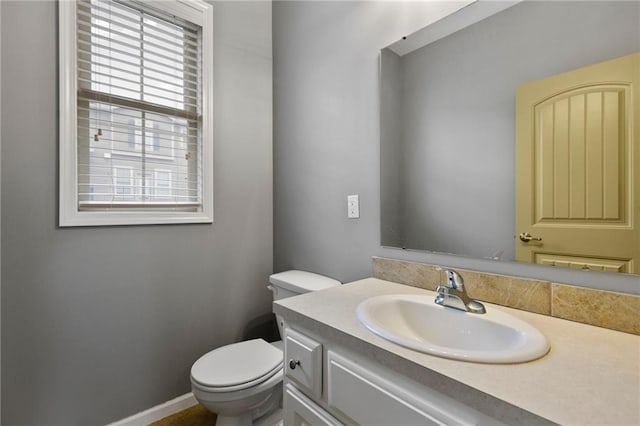 5245 Overland Dr, Lawrence, KS 66049 - half bathroom with vanity and toilet