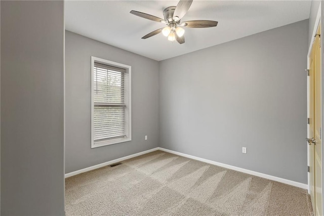 5245 Overland Dr, Lawrence, KS 66049 - carpeted spare room featuring ceiling fan and baseboards