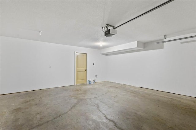 5245 Overland Dr, Lawrence, KS 66049 - garage featuring a garage door opener