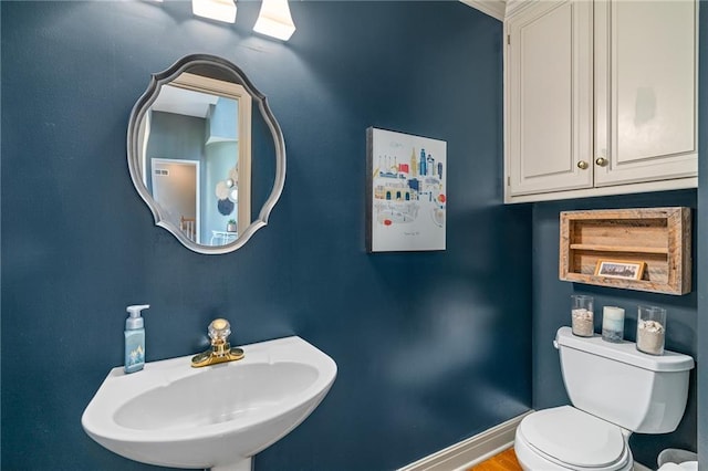 15998 Overbrook Ln, Overland Park, KS 66224 - half bath featuring a sink and toilet