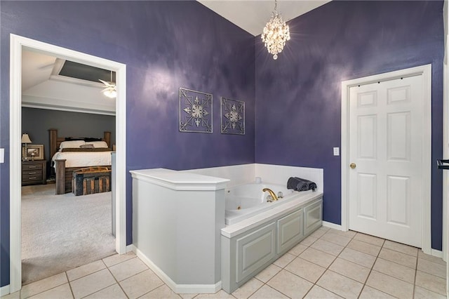15998 Overbrook Ln, Overland Park, KS 66224 - full bathroom with tile patterned flooring, a jetted tub, a ceiling fan, a chandelier, and vaulted ceiling