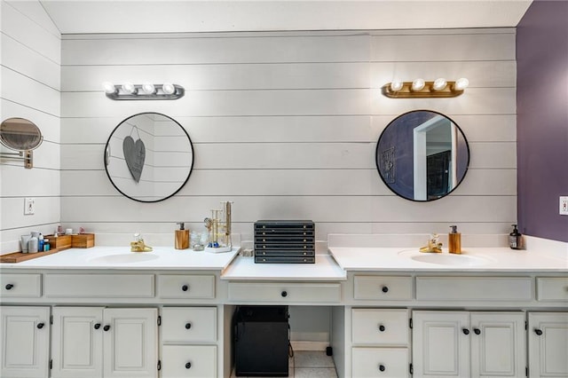 15998 Overbrook Ln, Overland Park, KS 66224 - bathroom featuring wood walls and double vanity