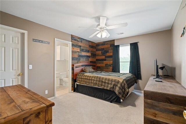 15998 Overbrook Ln, Overland Park, KS 66224 - carpeted bedroom with a ceiling fan and connected bathroom