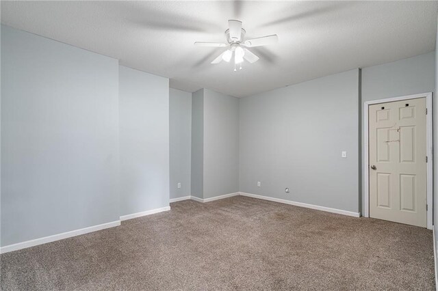 15998 Overbrook Ln, Overland Park, KS 66224 - carpeted spare room with ceiling fan and baseboards