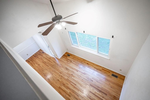255 N Michigan St Unit 1-2, Lawrence, KS 66044 - spare room with ceiling fan, light wood-style flooring, vaulted ceiling, and baseboards