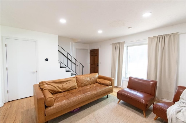 1739 W 26th St, Lawrence, KS 66047 - living area with light wood finished floors, recessed lighting, and stairs