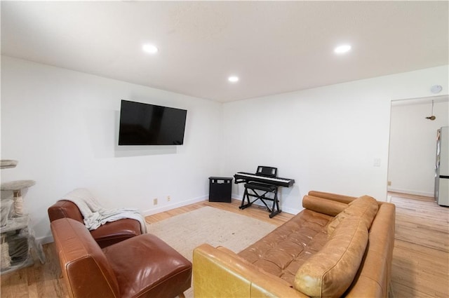 1739 W 26th St, Lawrence, KS 66047 - living room with light wood-type flooring and recessed lighting