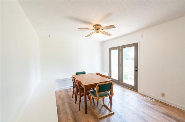 1739 W 26th St, Lawrence, KS 66047 - dining space featuring light wood-type flooring and ceiling fan