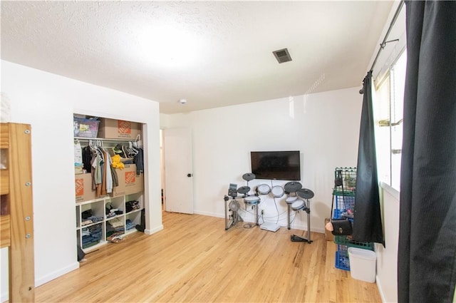 1739 W 26th St, Lawrence, KS 66047 - bedroom with light wood-style flooring and a closet