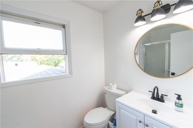 1739 W 26th St, Lawrence, KS 66047 - bathroom featuring vanity and a shower with door