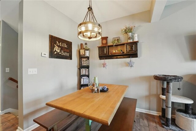 207 N Laurel St Unit 5D, Gardner, KS 66030 - dining room featuring dark wood-type flooring and baseboards
