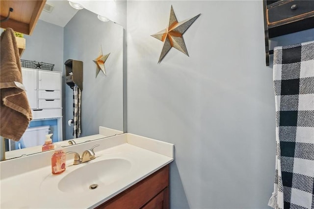 207 N Laurel St Unit 5D, Gardner, KS 66030 - bathroom featuring vanity and a shower with curtain