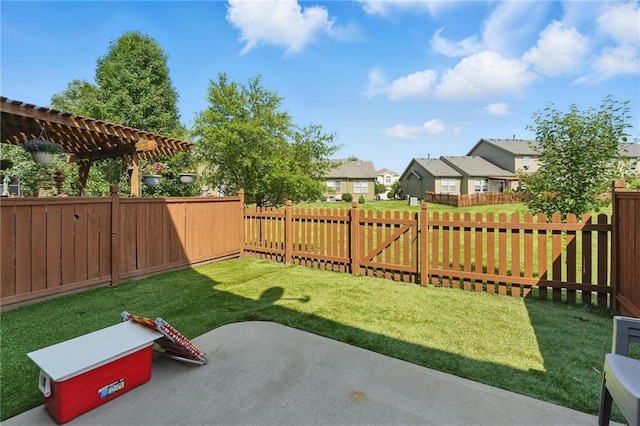 207 N Laurel St Unit 5D, Gardner, KS 66030 - fenced backyard with a residential view, a pergola, and a patio area