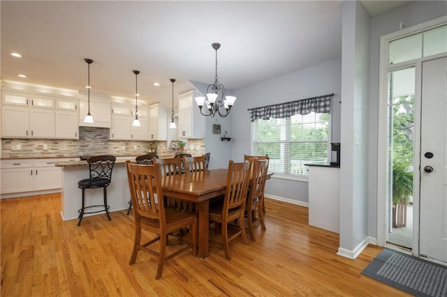 35705 E Rd Mize Rd, Oak Grove, MO 64075 - dining area featuring light wood-style floors, a chandelier, and recessed lighting