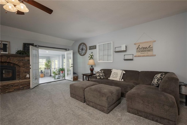 35705 E Rd Mize Rd, Oak Grove, MO 64075 - carpeted living area featuring a ceiling fan and a stone fireplace