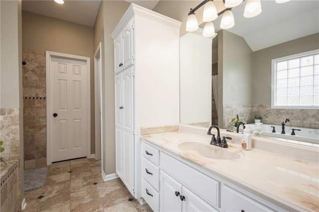 35705 E Rd Mize Rd, Oak Grove, MO 64075 - full bathroom featuring vanity, tiled shower, a bath, a chandelier, and vaulted ceiling