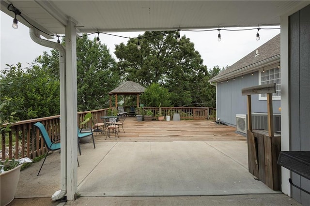35705 E Rd Mize Rd, Oak Grove, MO 64075 - view of patio / terrace featuring a wooden deck and outdoor dining space