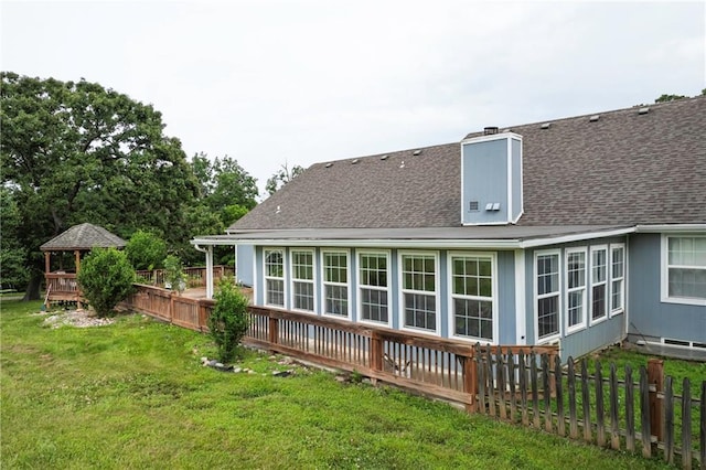 35705 E Rd Mize Rd, Oak Grove, MO 64075 - rear view of house with roof with shingles, a gazebo, and a chimney