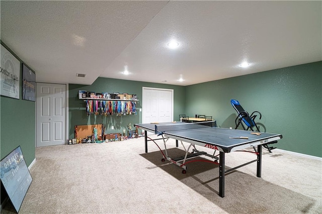 3206 Sheffield Ln, Saint Joseph, MO 64506 - recreation room with carpet floors, a textured ceiling, baseboards, and recessed lighting