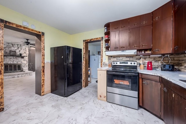 4207 10th Ave, Leavenworth, KS 66048 - kitchen featuring freestanding refrigerator, stainless steel electric range oven, under cabinet range hood, light countertops, and ceiling fan
