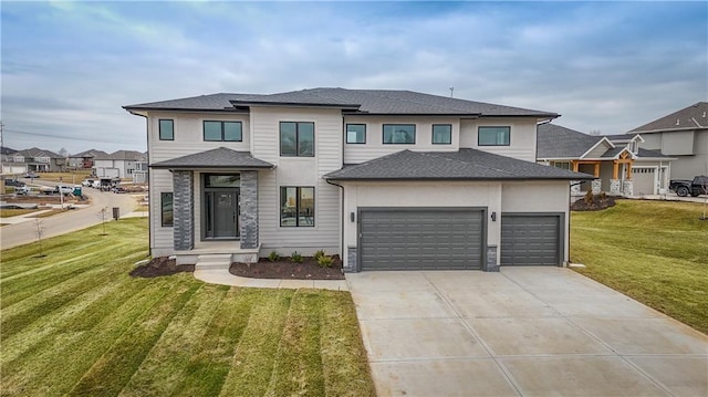 6018 Arapahoe St, Shawnee, KS 66226 - prairie-style home with driveway, a front yard, an attached garage, and stone siding