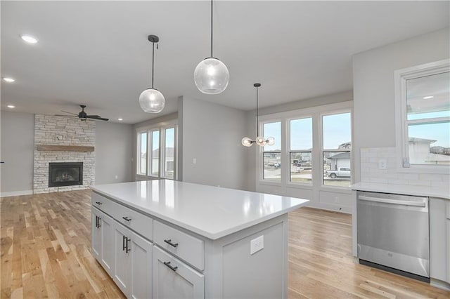 6018 Arapahoe St, Shawnee, KS 66226 - kitchen with dishwasher, a ceiling fan, plenty of natural light, light countertops, and recessed lighting