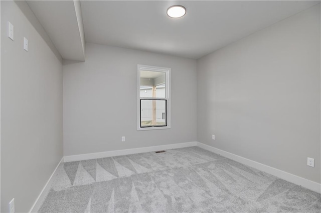 6018 Arapahoe St, Shawnee, KS 66226 - empty room with carpet flooring and baseboards
