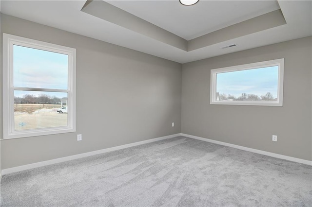 6018 Arapahoe St, Shawnee, KS 66226 - carpeted spare room featuring a raised ceiling and baseboards