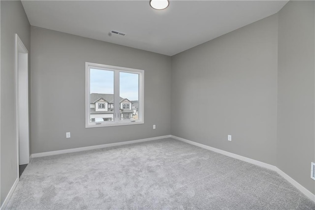 6018 Arapahoe St, Shawnee, KS 66226 - carpeted spare room featuring baseboards
