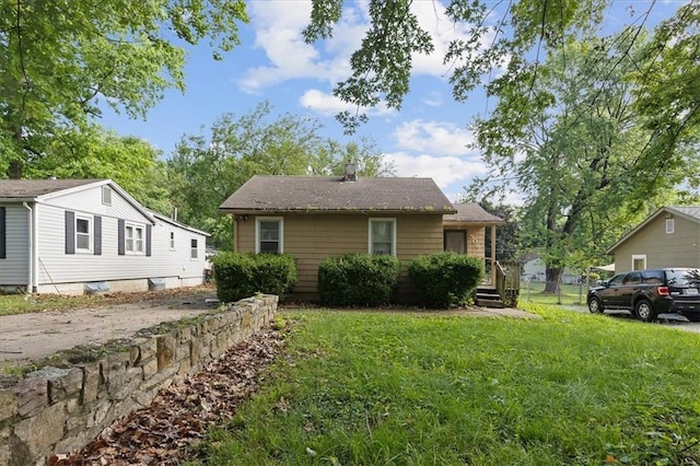 506 Hereford Ave, Independence, MO 64055 - view of front of house with a front yard