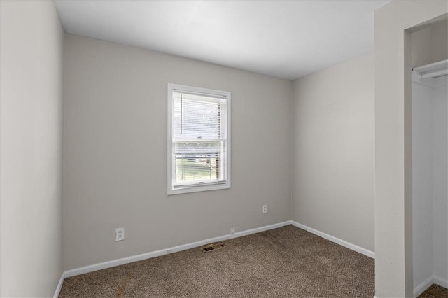 506 Hereford Ave, Independence, MO 64055 - empty room with carpet and baseboards