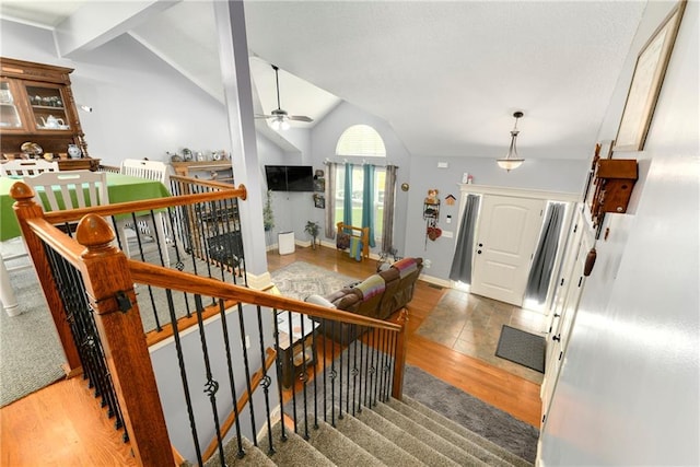 4316 Grand Ave, Leavenworth, KS 66048 - stairway featuring wood finished floors, a ceiling fan, and baseboards