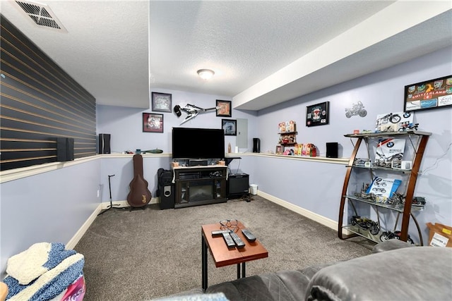 4316 Grand Ave, Leavenworth, KS 66048 - carpeted living room featuring a textured ceiling and baseboards