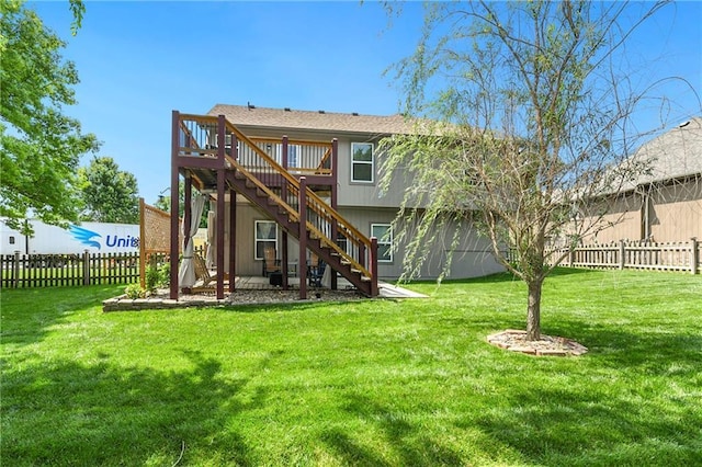 4316 Grand Ave, Leavenworth, KS 66048 - rear view of property with stairway and a wooden deck