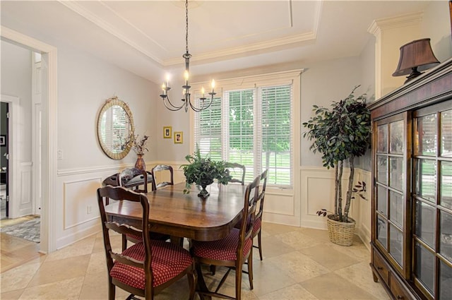 18765 S Alden St, Olathe, KS 66062 - dining room with a chandelier, a decorative wall, a wainscoted wall, a tray ceiling, and ornamental molding