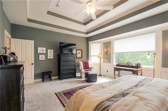 18765 S Alden St, Olathe, KS 66062 - bedroom with light colored carpet, ornamental molding, a tray ceiling, and ceiling fan