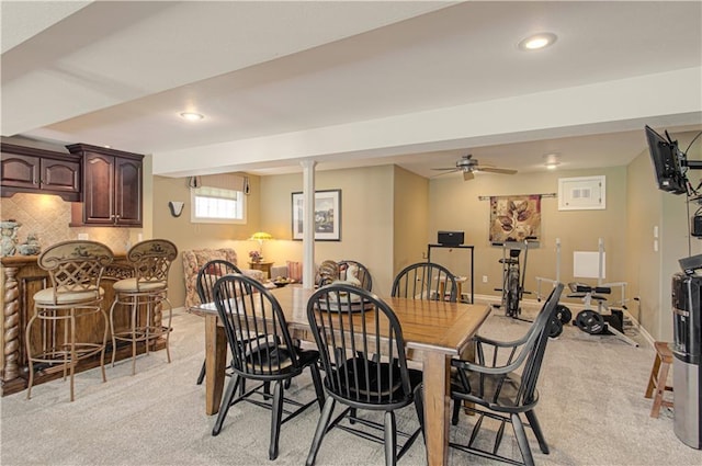 18765 S Alden St, Olathe, KS 66062 - dining area featuring light colored carpet, recessed lighting, and a dry bar