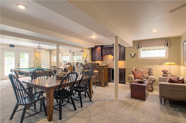 18765 S Alden St, Olathe, KS 66062 - dining room featuring light colored carpet, healthy amount of natural light, bar, and recessed lighting
