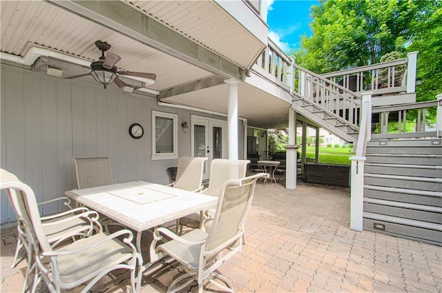 18765 S Alden St, Olathe, KS 66062 - view of patio / terrace featuring outdoor dining area, french doors, stairway, ceiling fan, and a wooden deck