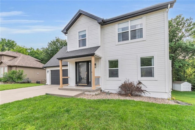 1610 Renea Ct, Kearney, MO 64060 - view of front of house with concrete driveway, a front lawn, and a garage