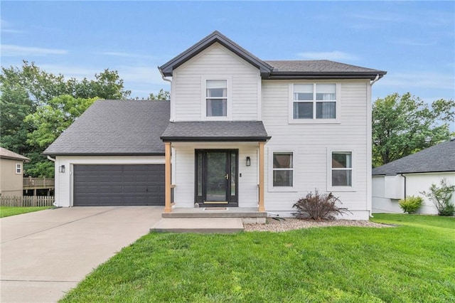 1610 Renea Ct, Kearney, MO 64060 - view of front of house featuring an attached garage, driveway, and a front lawn